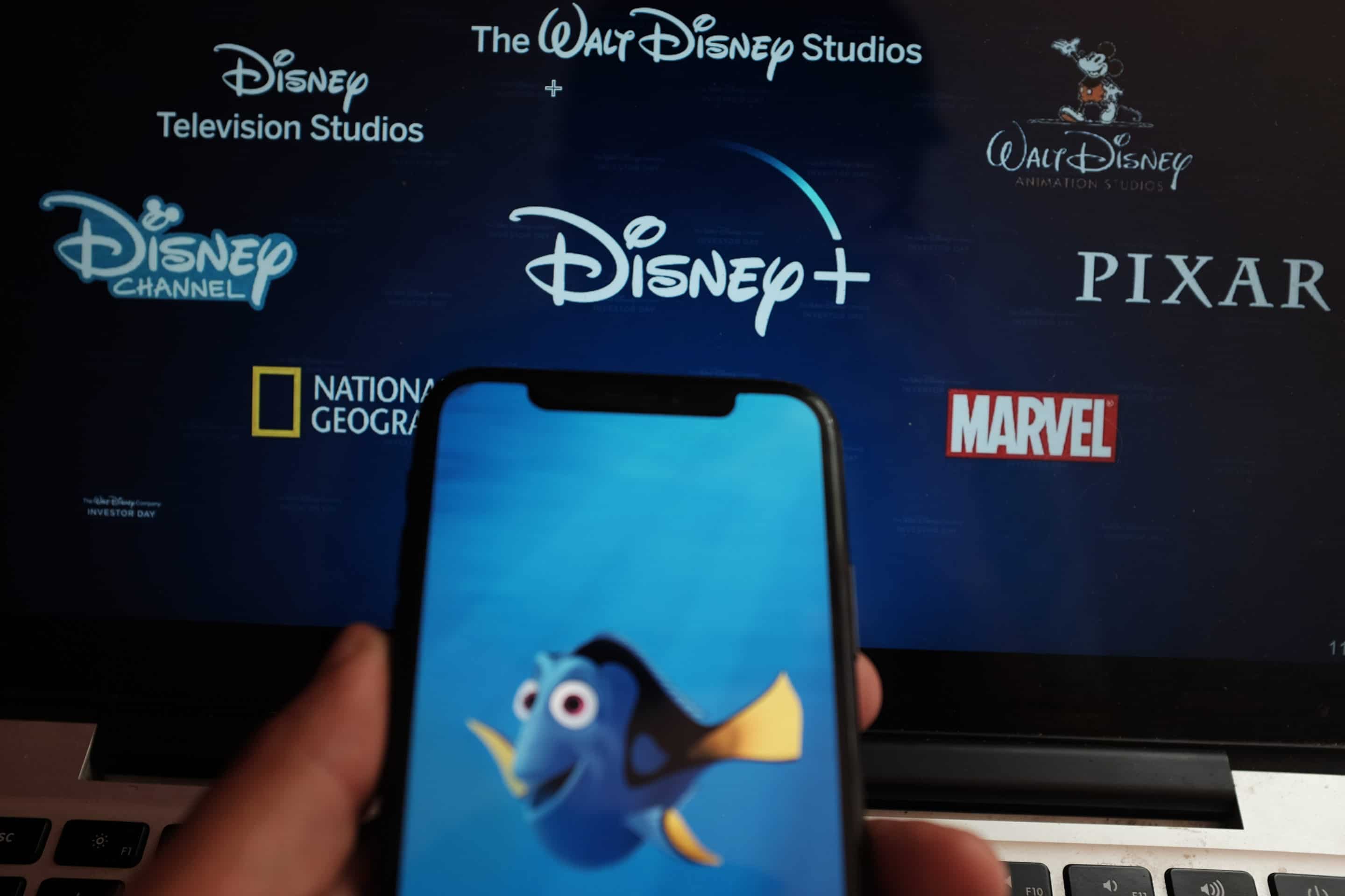 Watching Disney plus on phone and laptop